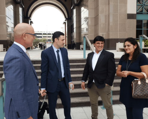 Attorneys at Lytal, Reiter, Smith, Ivey and Fronrath exiting the courthouse with the plaintiff's family