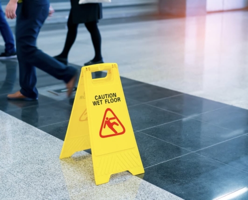 wet floor marker sits in high-traffic establishement