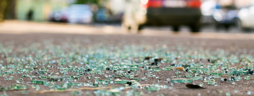 Who is responsible for car damage from road debris?