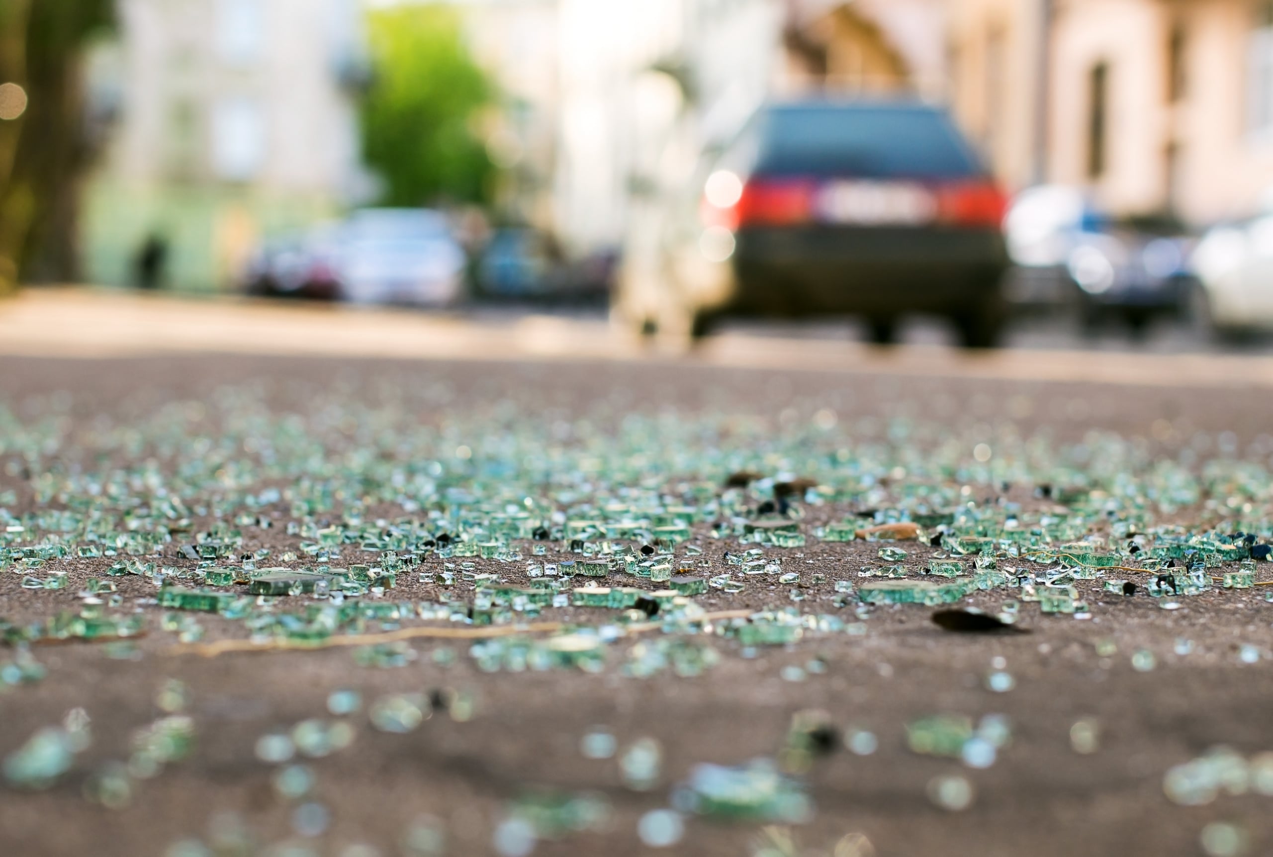 Who is responsible for car damage from road debris?
