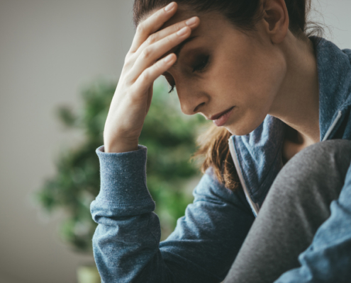 Woman mourning the wrongful death of a spouse.