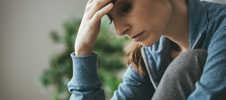 Woman mourning the wrongful death of a spouse.