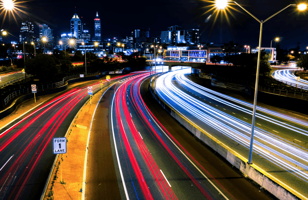 timelapse of highway going into city