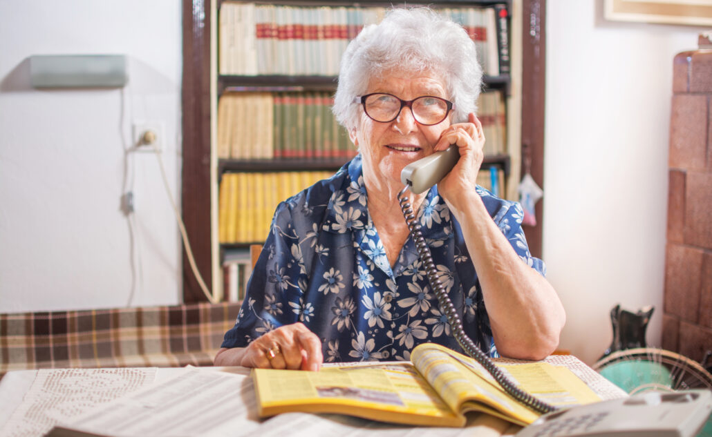 elderly person on phone