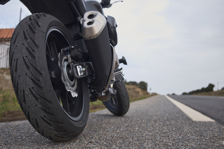 What causes a highside motorcycle crash