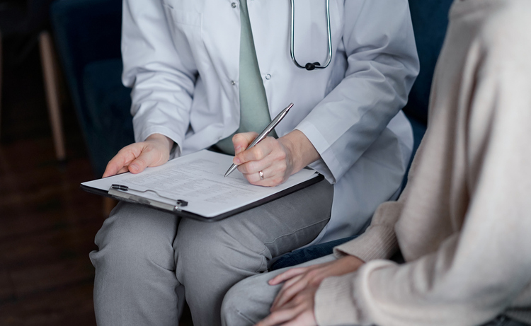 doctor with patient - how an accident or injury history could influence a personal injury claim