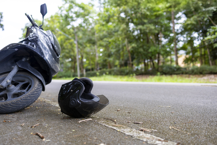 motorcycle crashed on the side of the road - how to find a good motorcycle accident lawyer