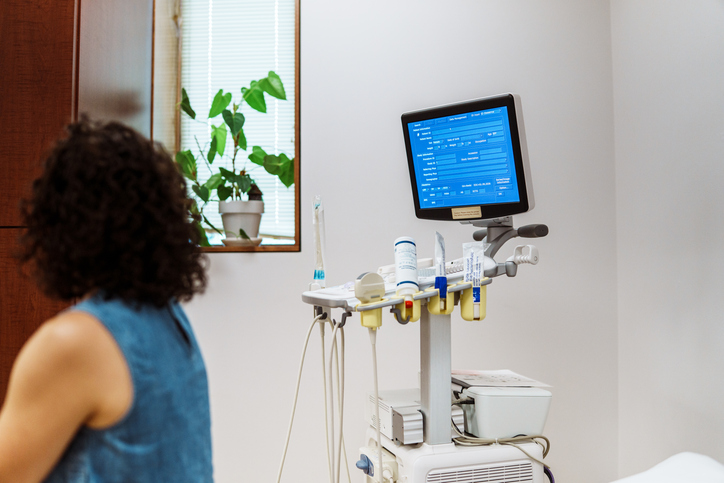 Woman at a hospital looking at an ultrasound monitor - Can a car accident cause internal bleeding?